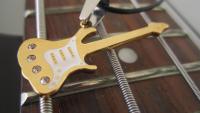Gold Guitar Pendant with White Scratch Plate